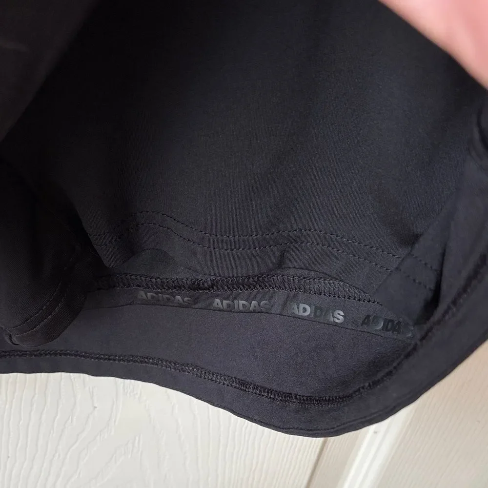Adidas Women’s Black skirt ruffle built in shorts zip pockets size medium EUC